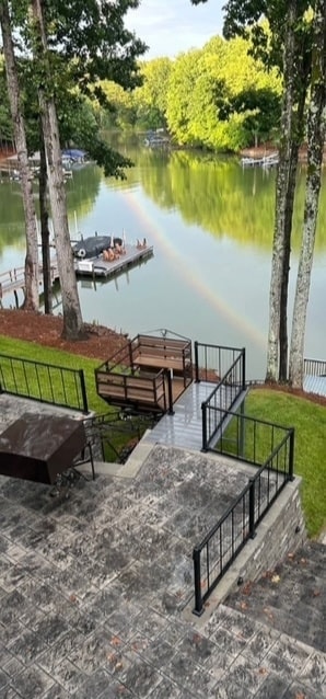 Mature couple enjoying a waterfront property
